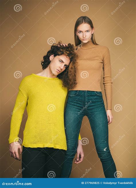 Sensual Portrait Of Young Couple Couple Of Man With Curly Hair And Blonde Woman In Hairdresser