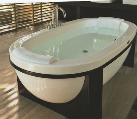 Enjoy a hot bath filled with bath salts and bubbles, while being surrounded by candles, and good company. Double bath---that is the biggest bath tub in the world ...