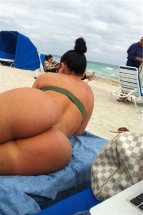 Brunette Ass On Beach