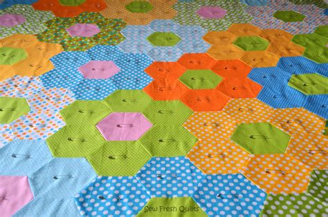 By creating a floor pattern with tile, one can express his/her personal style and design a truly unique room. Sew Fresh Quilts: Hexagon Quilt