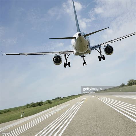 Xl Jet Airplane Landing On Runway High-Res Stock Photo - Getty Images