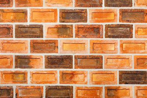 Texture Of Orange Brick Tiles On The Facade Of The Wall Close Up Stock