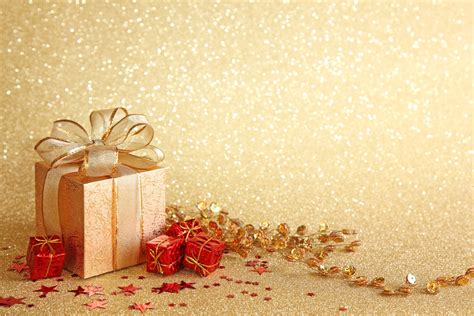 The practice of giving gifts during christmastide. Christmas Present Wallpaper - WallpaperSafari