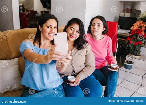 Latin Girls Having Fun At Home Taking Selfie Photo Laughing And