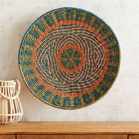 Finished in white, brown and coastal colors, they are woven with a unique undulating hourglass weave that creates subtle patterns and textures across the finished surfaces. Woven Rattan Wall Decor | Pier 1 Imports | Diy wall decor ...