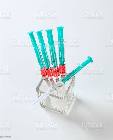 Syringes Filled With Red Fluid Stock Photo Download Image Now Blood