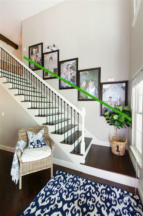 How To Create A Stairway Picture Wall Decorating Stairway Walls