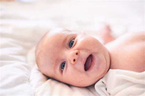 Premium Photo Adorable Baby Boy In White Sunny Bedroom Newborn