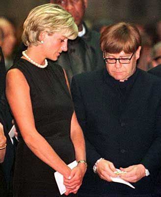 Miss you so much, adding a crying emoji, a heart emoji and the hashtag #princessdiana. Diana, with Elton John at the funeral of Gianni Versace ...