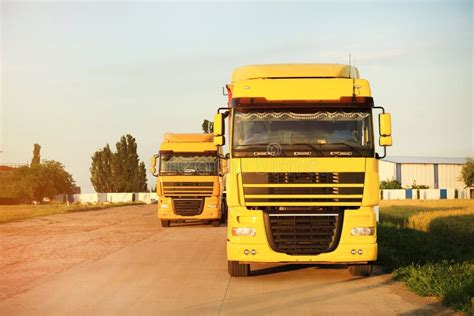 Yellow Trucks Parked Stock Photo Image Of Cargo Industry 18526536