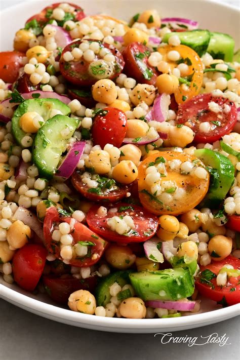 Couscous is a berber dish made from moistened semolina wheat and flour, and it's commonly used in countries like morocco, algeria, tunisia, and libya. Israeli Couscous Salad - Craving Tasty