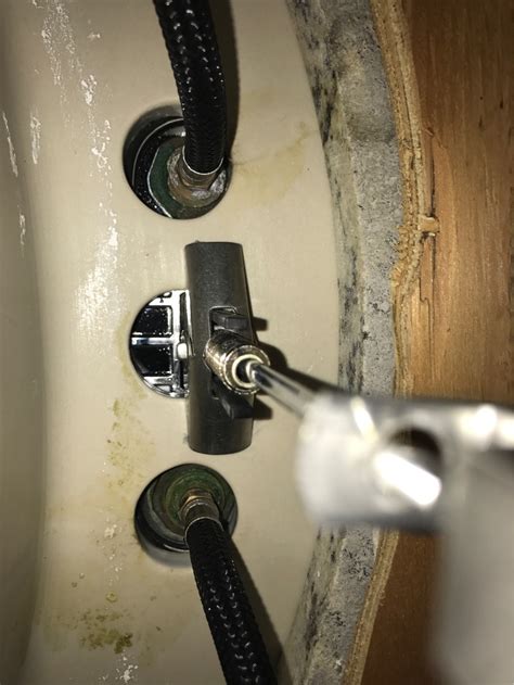 Here are the steps to guide you on how to install a bathroom faucet. plumbing - Tightening a bathroom faucet - Home Improvement ...