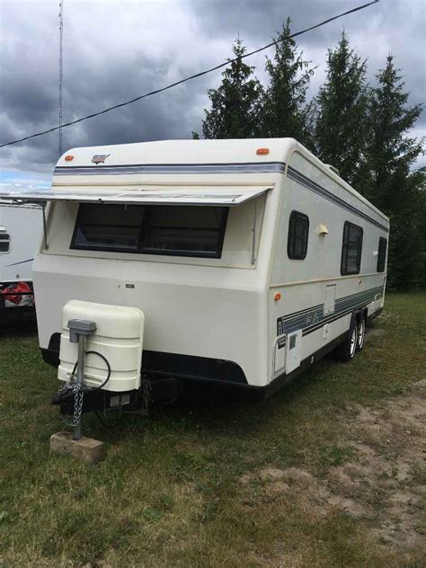 I am assuming that you want to know where the catalytic converter is in your 1990 cadillac. 1990 Used Holiday Rambler ALUMA-LITE 31 Travel Trailer in ...