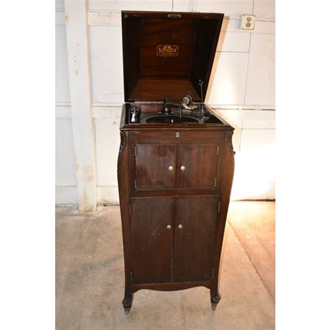 1) a metal plate with machine and company identification (similar to picture on left). Antique Rca Victor Record Player Cabinet | www ...
