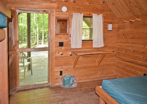Each of our cabins include heat and air conditioning, flat screen tvs, dvd players, internet, coffee makers, toasters, microwaves, dishes, pots and pans, linens and towels, porches, bbq, fire pit and picnic tables for your enjoyment. Newberry Campground Cabin Rental | UP Cabin Rental