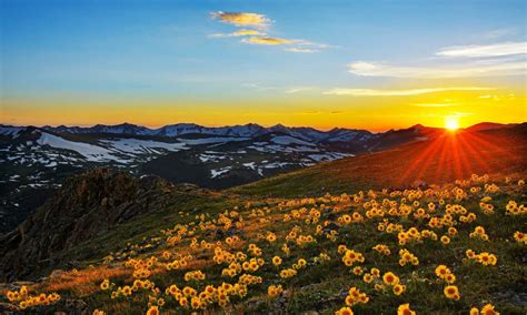 Sunset Sun Rays Landscape Stone Peaks Mountain Meadow With Yellow