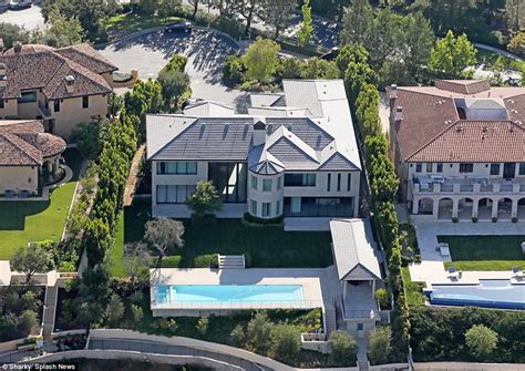 Kim Kardashian And Kanye West Move Into 20m Mansion Daily Mail Online