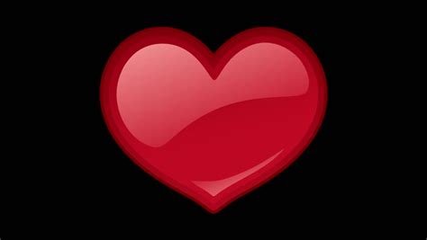 Pulsating Red Heart With The Light On An Isolated Black Background