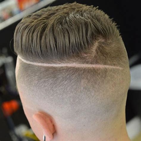 Haircut with design in the back. 25 Cool Shaved Sides Hairstyles For Men (2021 Guide)