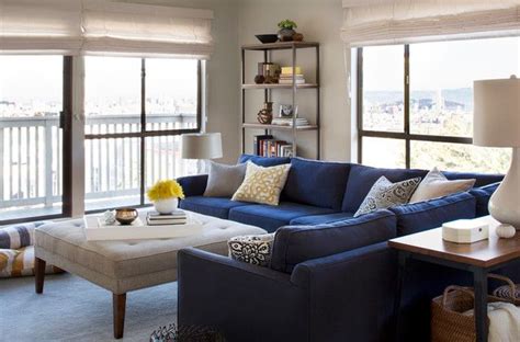 Blue is used in paint color, decor, accents and furniture to create a serene and calming atmosphere in the home. decorating with navy and white - Google Search | Blue sofa ...