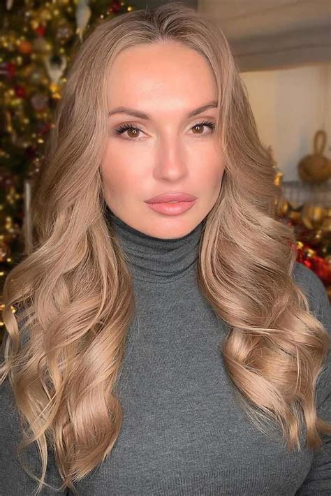 Short stylish and all about oomph, this hairstyle completely captivates the charm of beige blonde hair color shade. 57 Fantastic Dark Blonde Hair Color Ideas | LoveHairStyles.com