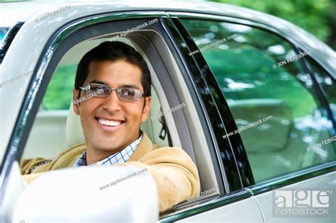 Hispanic Man Driving Car Stock Photo Picture And Royalty Free Image