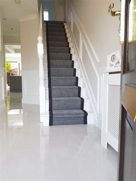On the landing the runner laid right up against the top set of stairs. Grey carpet, black border | Grey stair carpet, Grey carpet ...