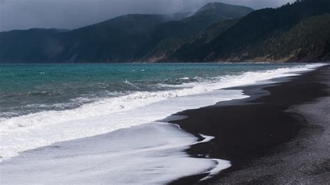 These Breathtaking Black Sand Beaches Offer An Exotic Escape On