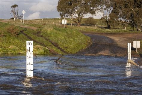 Image Of Country Road Through Flooded Causeway Austockphoto