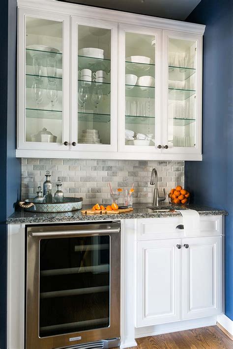 The Trick To Organizing A Kitchen With Glass Front Cabinets