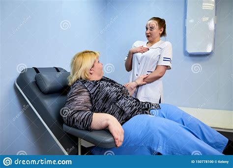 Inexperienced Doctor Asking Questions Royalty Free Stock Image