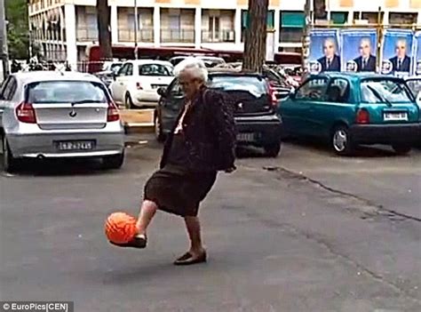 Elderly Italian Woman Shows Off Her Keep Up Football Skills In The