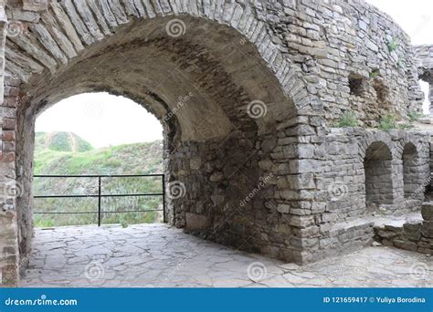 The Ruins Of The Ancient Fortress Are On The Mountain Stock Image