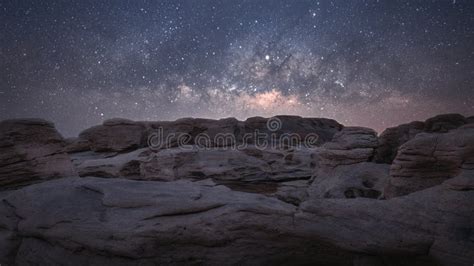 The Rocky Mountains At Night With The Milky Way Galaxy Stock Photo