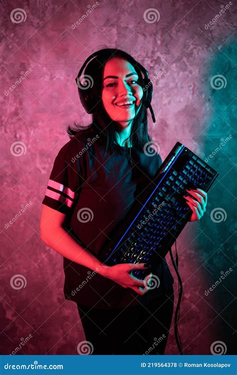 Beautiful Friendly Pro Gamer Streamer Girl Posing With A Keyboard In