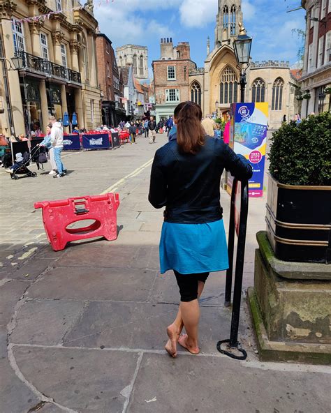 me standing barefoot in a busy city centre. I'm always happy to walk