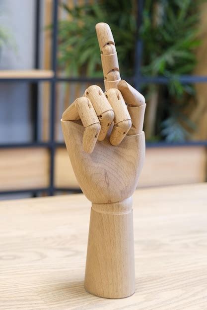 Premium Photo Model Of A Human Hand With The Index Finger Raised Up