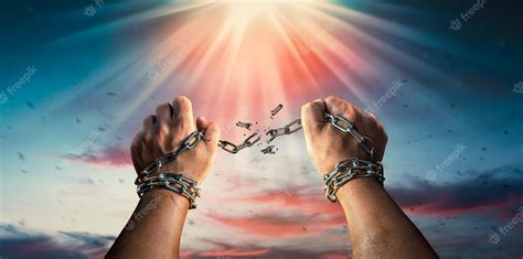 Premium Photo Hands In Fists Breaking A Chain Freedom The Concept Of