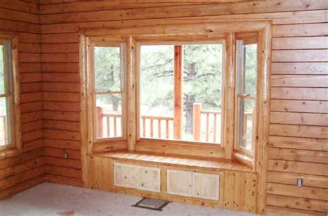 Your home or cabin will have a finished feel when the wood trim around your windows and doors pulls it all together —be sure to include it in your vision. A Beautiful Log Cabin Log railing log window trim log door ...