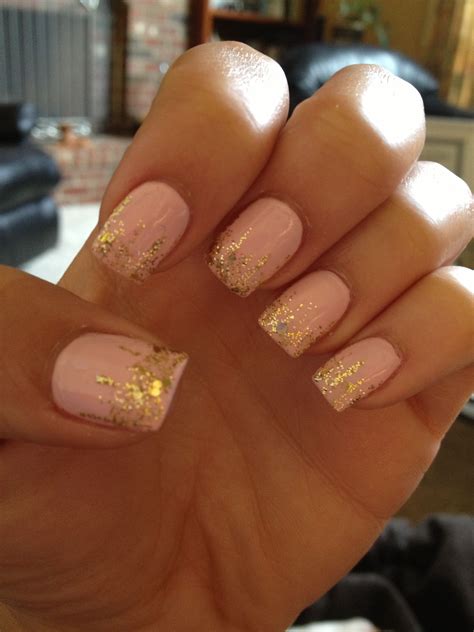 Light Pink Nails With Gold Glitter