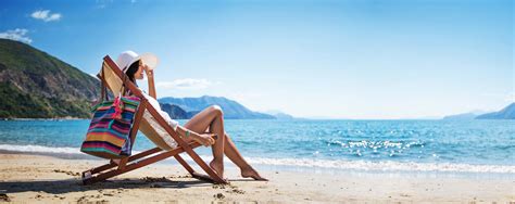 Woman Enjoying Sunbathing At Beach Lindsey Elmore