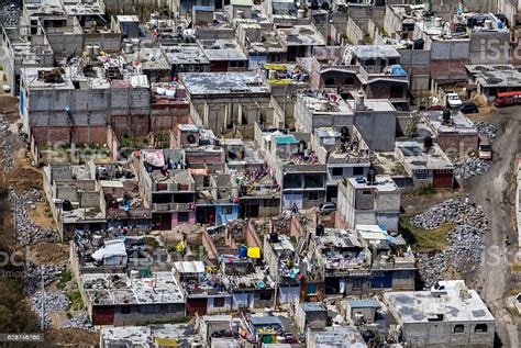 Cuauhtémoc is centered on the zócalo or main square which contains the aztec ruins of the templo mayor, the metropolitan cathedral and the national palace of mexico. Aerial View Of Slums In Mexico City Stock Photo - Download ...