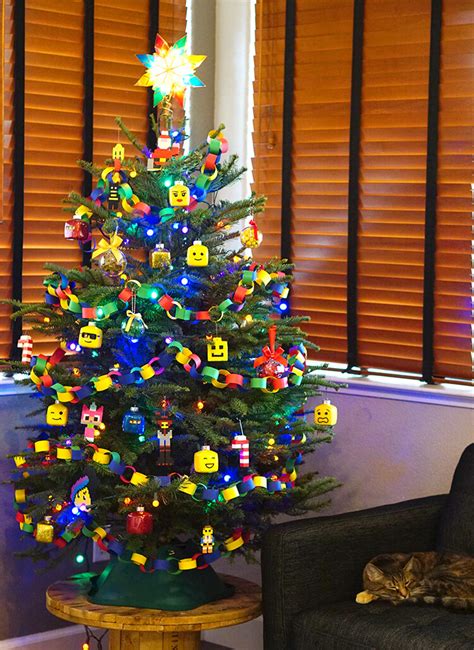 First create a snowman head and face from a large, foam floral sphere and place it at the top of the tree, says designer brian patrick flynn. Kids' LEGO Themed Christmas Tree - Happiness is Homemade