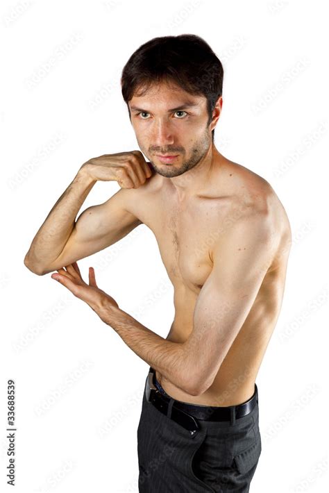 Very Skinny Guy Flexing Its Muscles Foto De Stock Adobe Stock