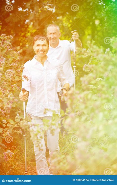 Two Senior People Walking In Nature Stock Photo Image Of Healthy