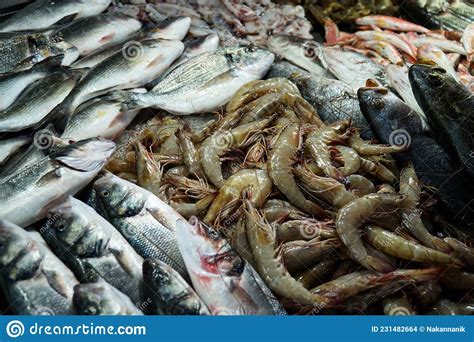 Fresh Fish And Seafood Laid Out On The Counter For Sale Stock Photo