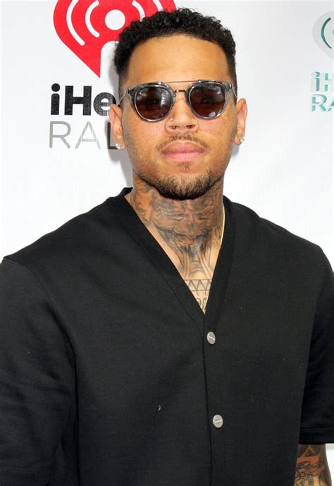 chris brown s hairstyles through the years essence