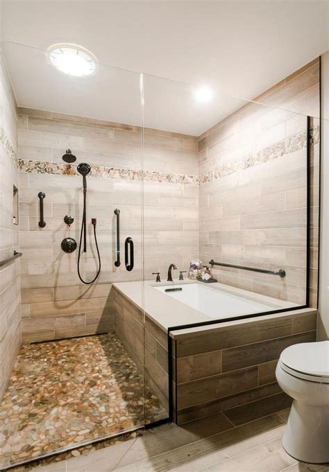 Having dual shower heads with a handheld at the seat with a standing main head, brings luxury to your bathroom remodeling project. This master bath remodel features a beautiful corner tub ...