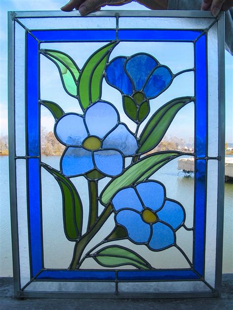 Bathroom windows are a little tricky because you want both. Stained Glass Windows by Michael D. Mann