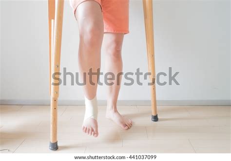 Disabled Injured Person Sprained Ankle Using Stock Photo 441037099